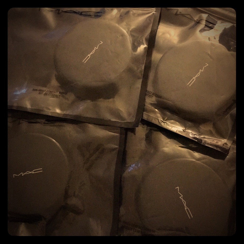 Four MAC mirror compacts